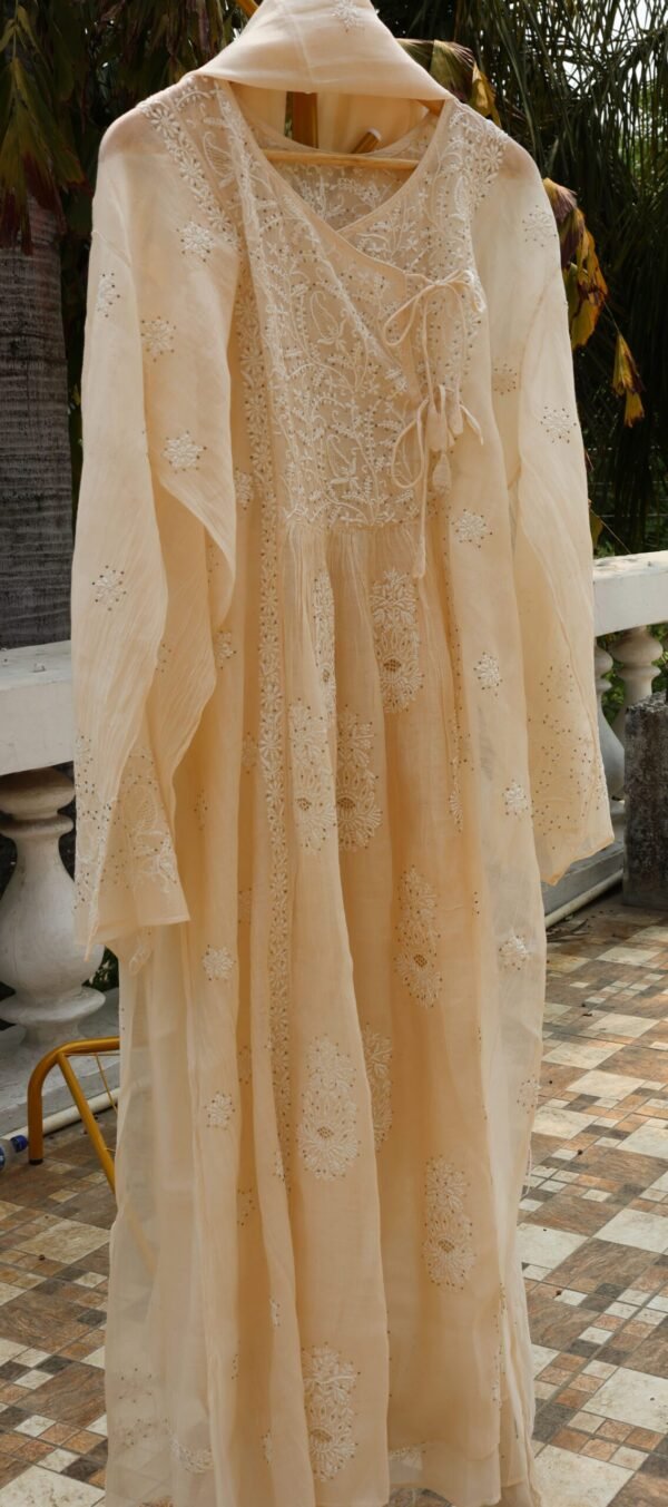 Nude Peach Colored Chanderi Angrakha Suit with Dupatta.