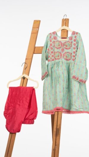 Modal Fabric Frock Style Kurta with Silk Pants for Girls. Adorned with Chikankari and Aari Work.